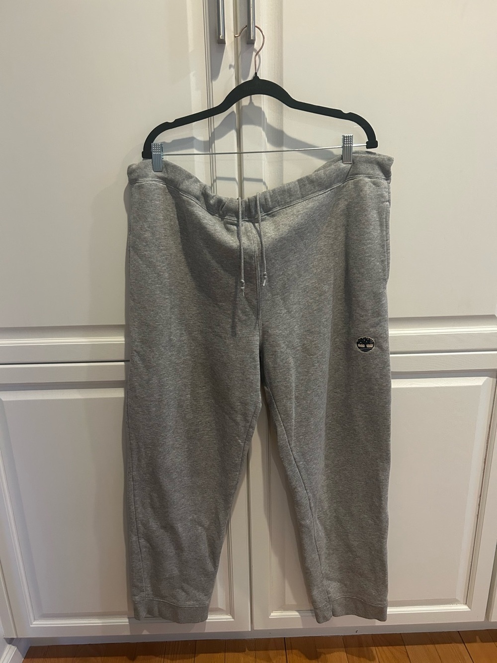 Women’s large gray sweatpants by Timberland with side pockets and a back pocket